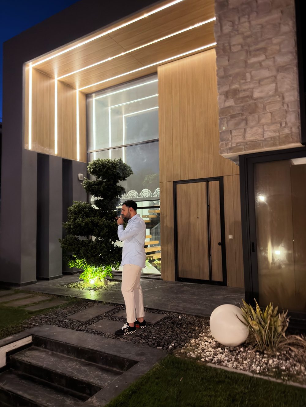 Outside a modern villa at night